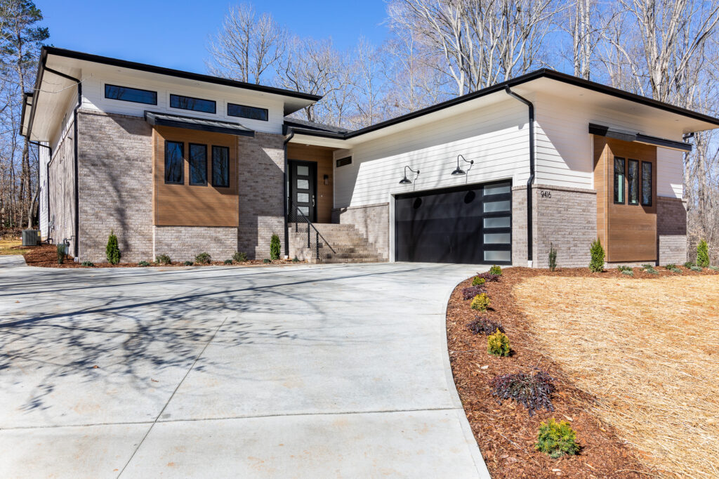 Angled View of Modern prairie home built by Ricci Builders in Lewisville, NC

